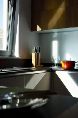 a kitchen with a counter top with a bowl and knives at Villa Riviera in Vari