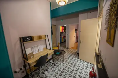 a office with a desk and a chair in a room at Pop Art Escape - Zografou by ΜΡS in Athens