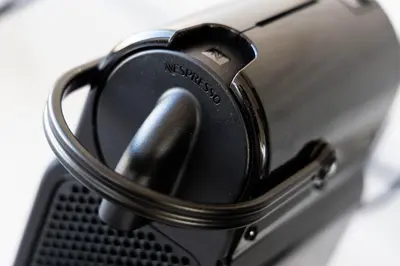 a close up of a cell phone with a holder at Acropolis Sky Retreat Jacuzzi & 3BR Maisonette in Athens