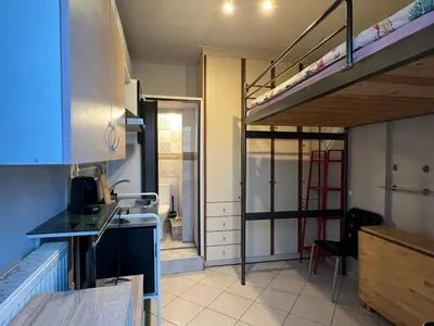 a small kitchen with a bunk bed in a room at Terrace View Studio in Athens