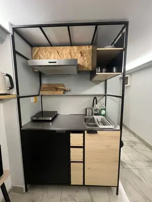 a kitchen with a counter and a sink at Athens Center Museum in Athens