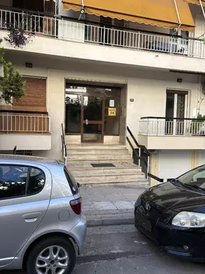 a car parked in front of a building at Evita's cozy Studio Next to Katehaki Metro in Athens