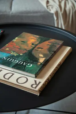 two books sitting on top of a table at Central Urban Retreat in Athens