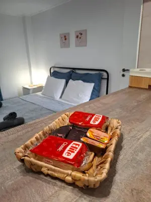 a tray of food sitting on top of a table at Iliana's Retreat by Greece Apartments in Athens