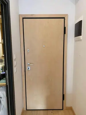 a wooden door in a room with a wall at 7th floor bright penthouse in quiet pedestrian in Athens
