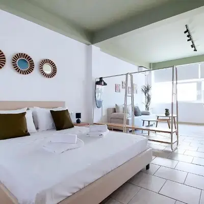 Modern comfort and city vibes just steps from Athe