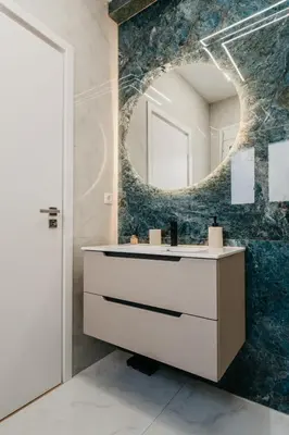 a bathroom with a sink and a mirror at Apartment 49 Athens in Athens