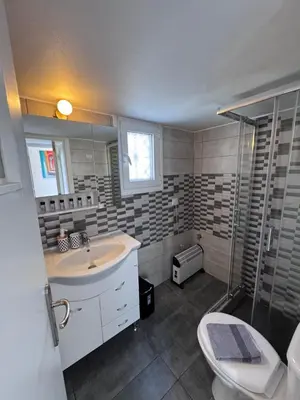 a bathroom with a sink and a shower and a toilet at Krezias Apartments K1 Acropolis View & Jacuzzi ! in Athens