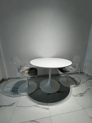 a white table and two chairs in a room at Krezias Apartments ST5 Acropolis View ! in Athens