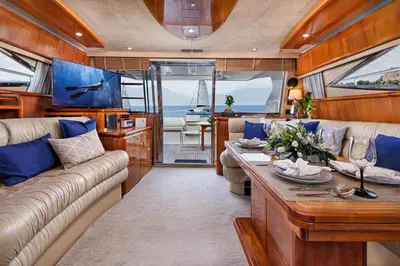 a living room with a couch and a table in a boat at DS MAI Sailing in Athens