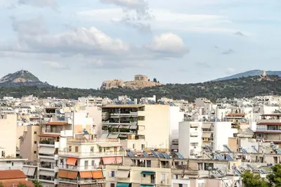 a view of a city with buildings at Sunlit Terrace 3BR Apartment - Tavros by ΜΡS in Athens