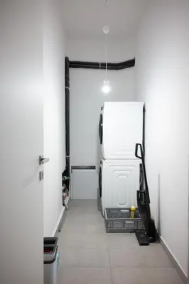 a white van is parked in a garage at Bright Urban Retreat in Athens in Athens