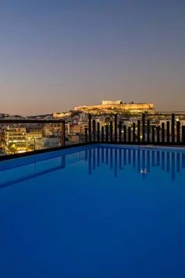 a view of the city from the rooftop of a building at Thea Acropolis Suites & Apartments in Athens