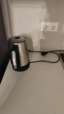 a coffee pot sitting on a counter next to a microwave at Athens Glyfada Luxury Loft Swimming Pool fully equipped all new in Athens