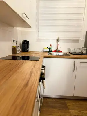 a kitchen with a sink and a counter top at The Cozy Spot Athens in Athens
