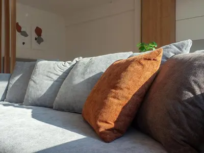 a couple of pillows sitting on top of a bed at Artemis Moonlight Suit in Athens