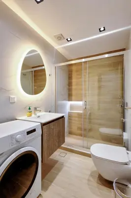 a bathroom with a toilet and a sink and a shower at Suncity apartments with garden in Athens