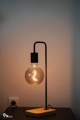 a light that is on top of a table at Irene's Home - Serene City Sanctuary in Athens in Athens