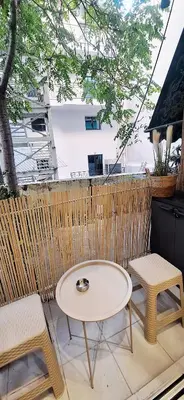 a table and two chairs on a patio at Best Stay Athens Metro in Athens