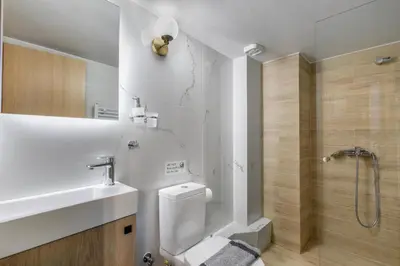 a bathroom with a toilet and a sink and a shower at Cassiopeia - Charming Studio & Balcony in Athens in Athens