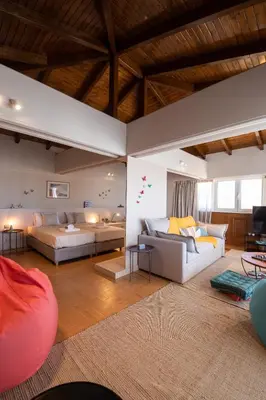 a living room with two couches and a couch at Luxury Apartment in Glyfada with Sea View in Athens