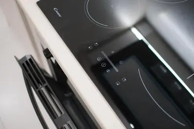 a close up of a cell phone in an oven at AtheNeon Deluxe Suite in Athens