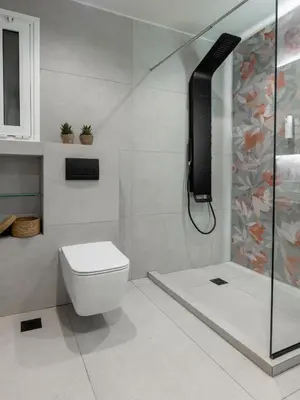 a bathroom with a shower with a toilet and a sink at Urban Blush Pangrati by Premium Key in Athens