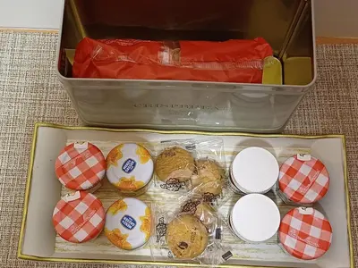 a lunch box filled with different types of food at Mary's vintage house in Athens