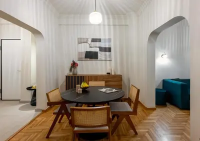 a dining room with a table and chairs at Urban Terra Pangrati by Premium Key in Athens