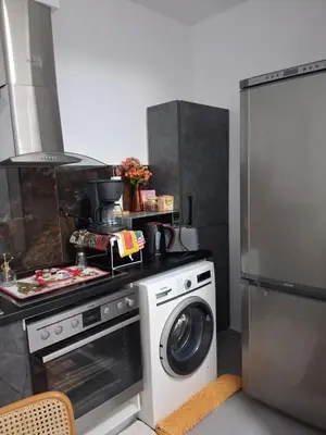a kitchen with a stove and a washing machine at B2 ACROPOLIs 2 in Athens