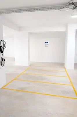 an empty room with yellow lines on the floor at Costa Elliniko Pool & Beach Sea View DA1 in Athens