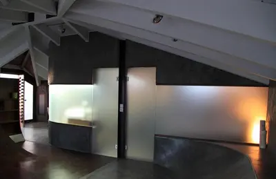 a room with two sliding doors in a building at Unique Loft with amazing view TheRampHouse Athens in Athens