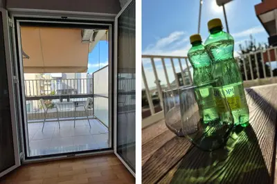 two empty soda bottles sitting on top of a window at Athens Riviera Alimos by Comfort Club in Athens