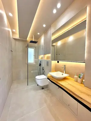 a bathroom with a sink and a toilet and a mirror at Boutique City Apartment 3' Metro in Athens