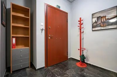 a room with a closet and a wooden door at Petralona 2BDRM -Easy Access to City Center by ΜΡS in Athens