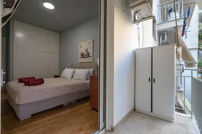 a bedroom with a bed in a room at Petralona 2BDRM -Easy Access to City Center by ΜΡS in Athens
