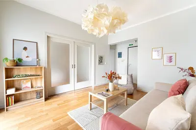 a living room with a couch and a table at Urban Grace - In the Heart of Athens in Athens