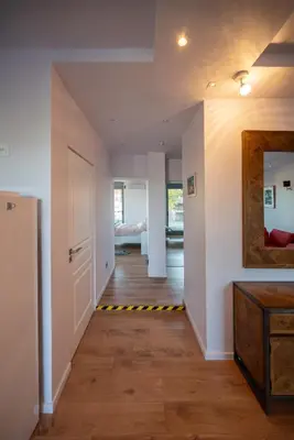 a hallway of a house with a door and a room at Villa Tata - Private Pool, Garden & Mountain View near the Sea in Metókhi