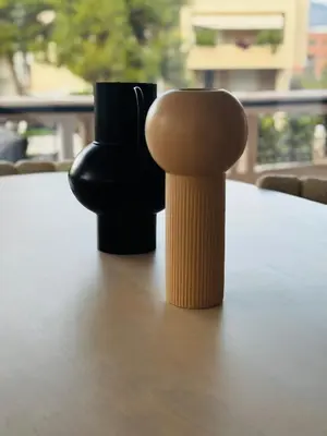 two black objects sitting on top of a table at Glyfada Unique Luxury & Spacious Apartment in Athens