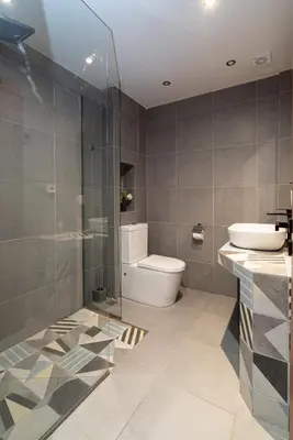 a bathroom with a toilet and a sink and a shower at Athens Dimora Di Aristotele 2 in Athens