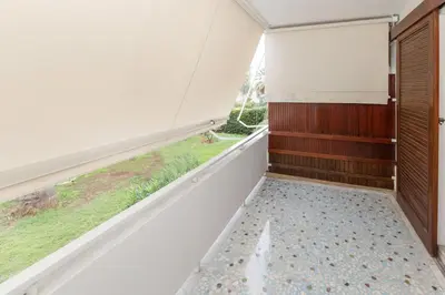a room with a window and a shower at Riviera Garden House in Athens