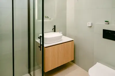 a bathroom with a sink and a shower at Spacious 2BR house in Nea Smyrni in Athens