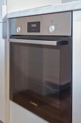 a microwave oven sitting inside of a kitchen at The Canopy Loft, A Curated 5-Star Experience in Athens