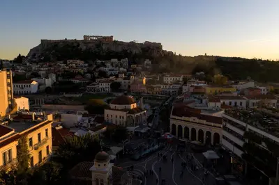 a view of a city with a hill in the background at DP Homes Acropolis Promenade in Athens