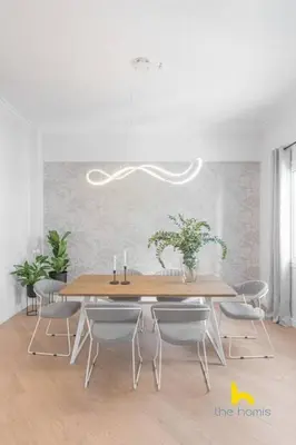 a dining room with a wooden table and chairs at Spacious 3BR Retreat w 2 Baths & Fast Wi-Fi in Athens