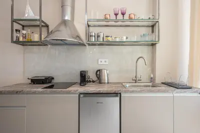 a kitchen with a sink and a counter top at Acropolis View Dream Stay nr 5 in Athens