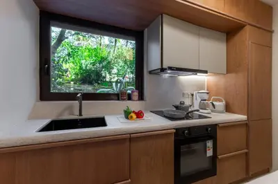a kitchen with a sink and a window at Modern Αpartment 12 in the center of Glyfada in Athens