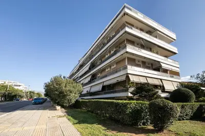 a large apartment building on the side of a street at Clavé - Deluxe Studio in Athens in Athens