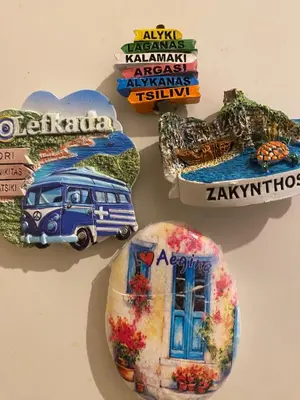 a group of plates hanging on a wall at Cosy full apartment in Athens