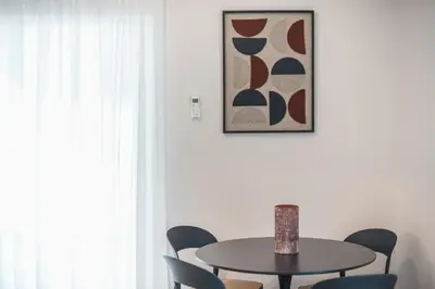 a dining room with a table and chairs at Zografou Urban Apartments, A2Zen in Athens